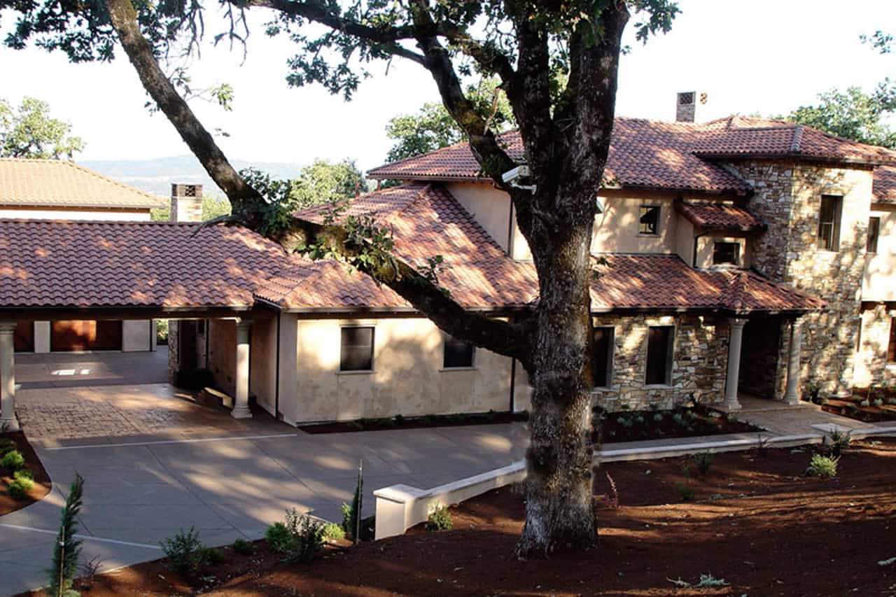 Front elevation of Spanish home (ThePlanCollection: House Plan #108-1567)