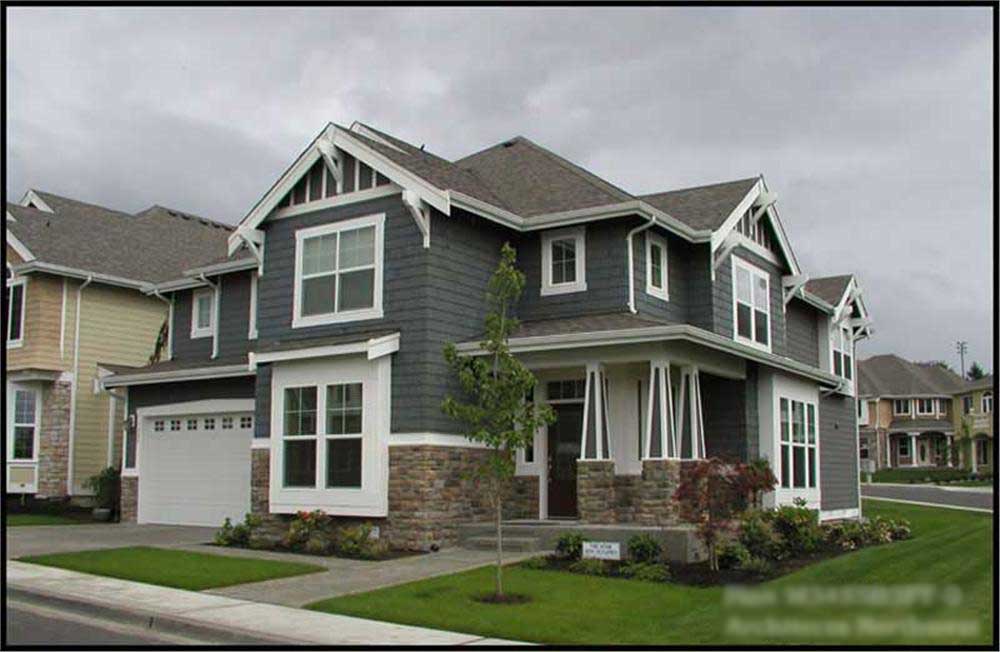 Front elevation of Craftsman home (ThePlanCollection: House Plan #115-1249)