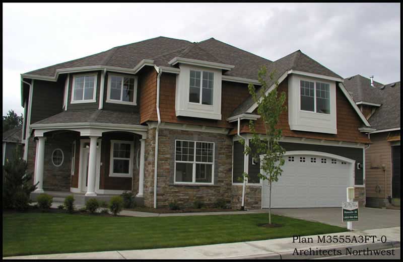 Front elevation of Shingle home (ThePlanCollection: House Plan #115-1328)