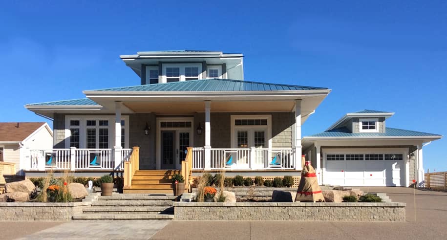 Color photograph of front of house plan 116-1036