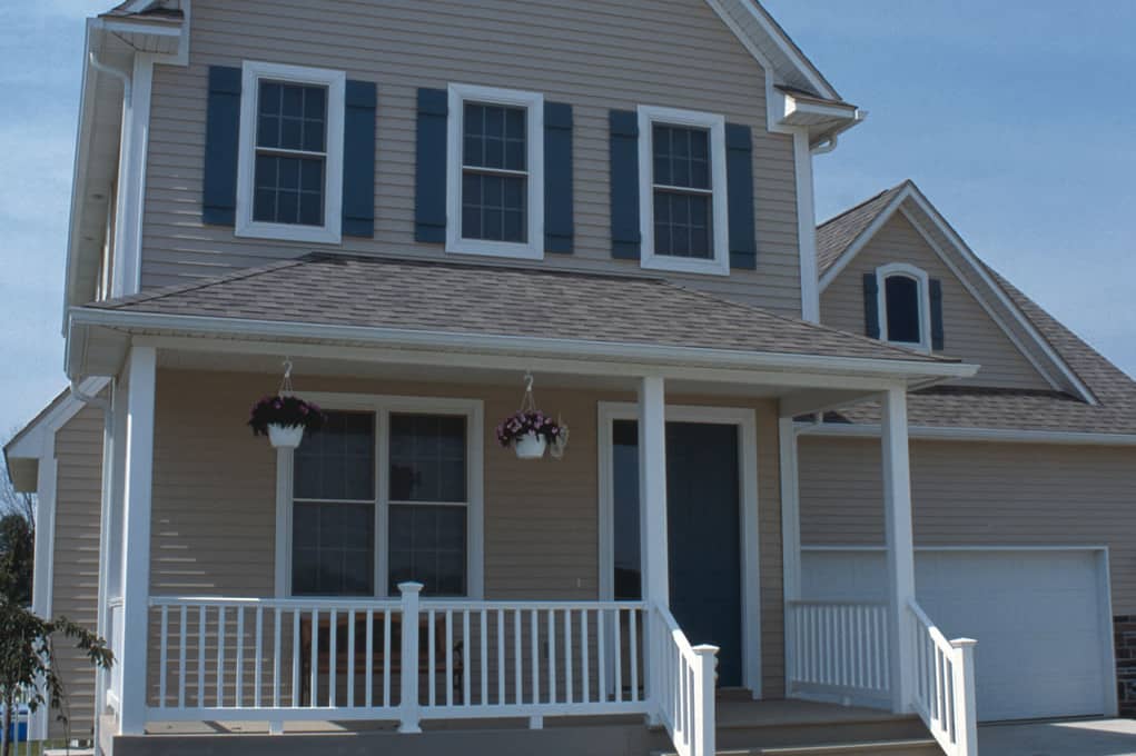 Color photograph of Colonial home plan (ThePlanCollection: House Plan #120-1669)