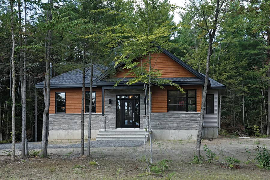 Color photograph of Country home plan (ThePlanCollection: House Plan #126-1871)