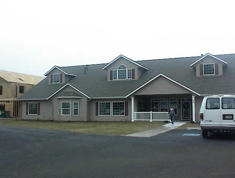 Front Elevation of this Multi-Unit House (#132-1343) at The Plan Collection.