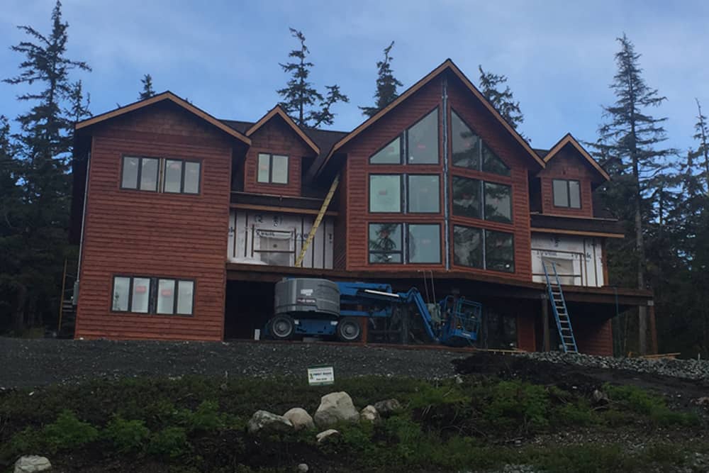 Front Elevation Photo of this Luxury House (#132-1676) at The Plan Collection.
