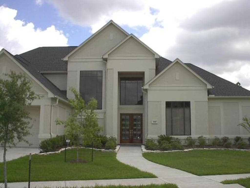 Front elevation of European home (ThePlanCollection: House Plan #134-1316)