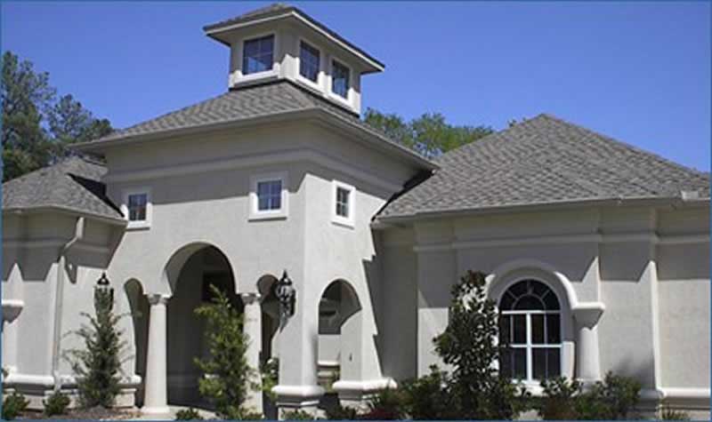 Front elevation of Luxury home (ThePlanCollection: House Plan #134-1319)