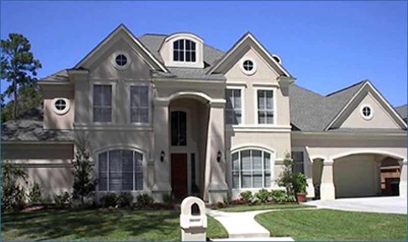 Front elevation of Luxury home (ThePlanCollection: House Plan #134-1362)