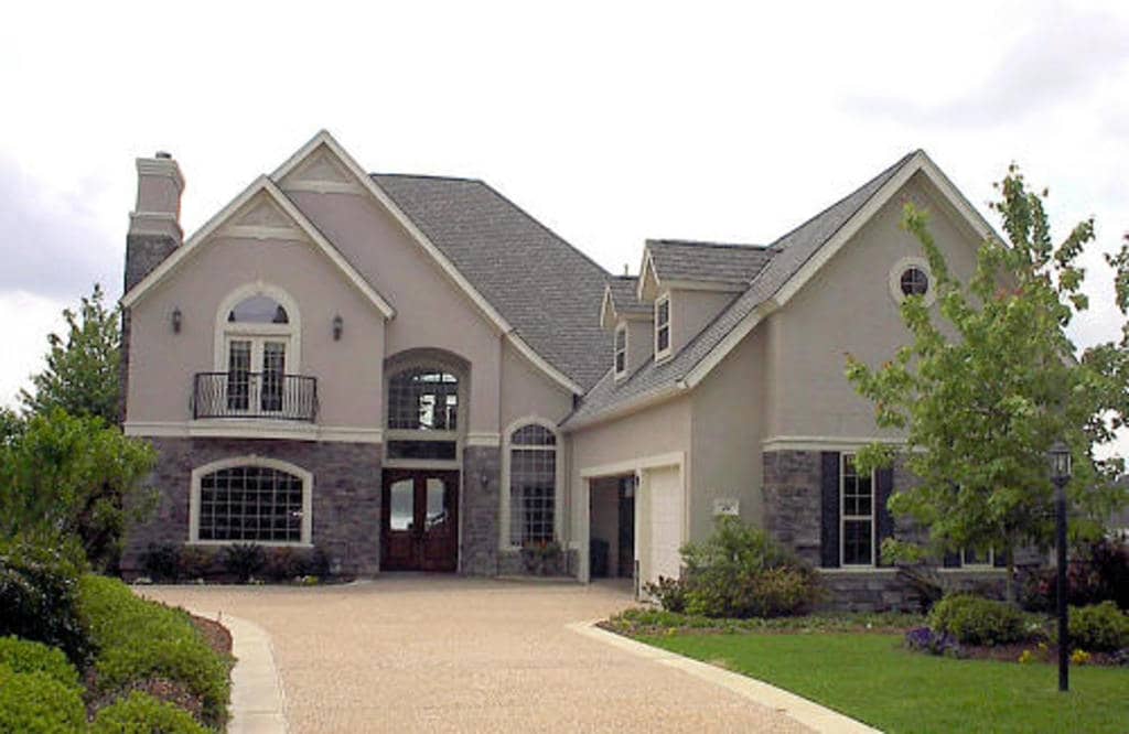 Photo of 4 bedroom French Country home.