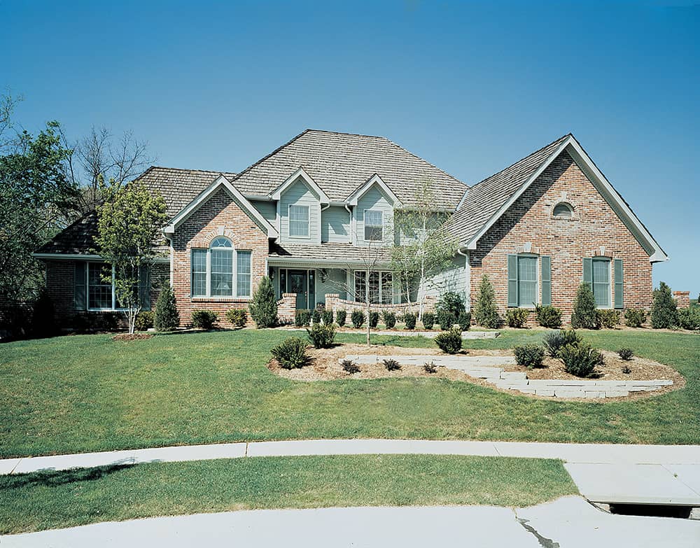 Color photograph of Traditional home plan (ThePlanCollection: House Plan #138-1307)