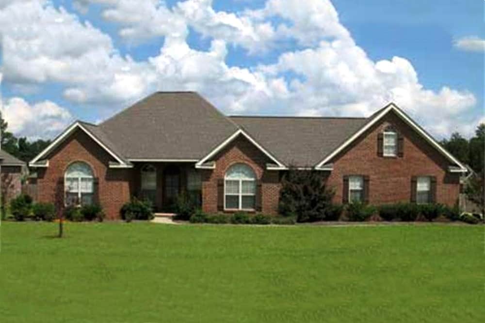 Front elevation of European home (ThePlanCollection: House Plan #141-1153)