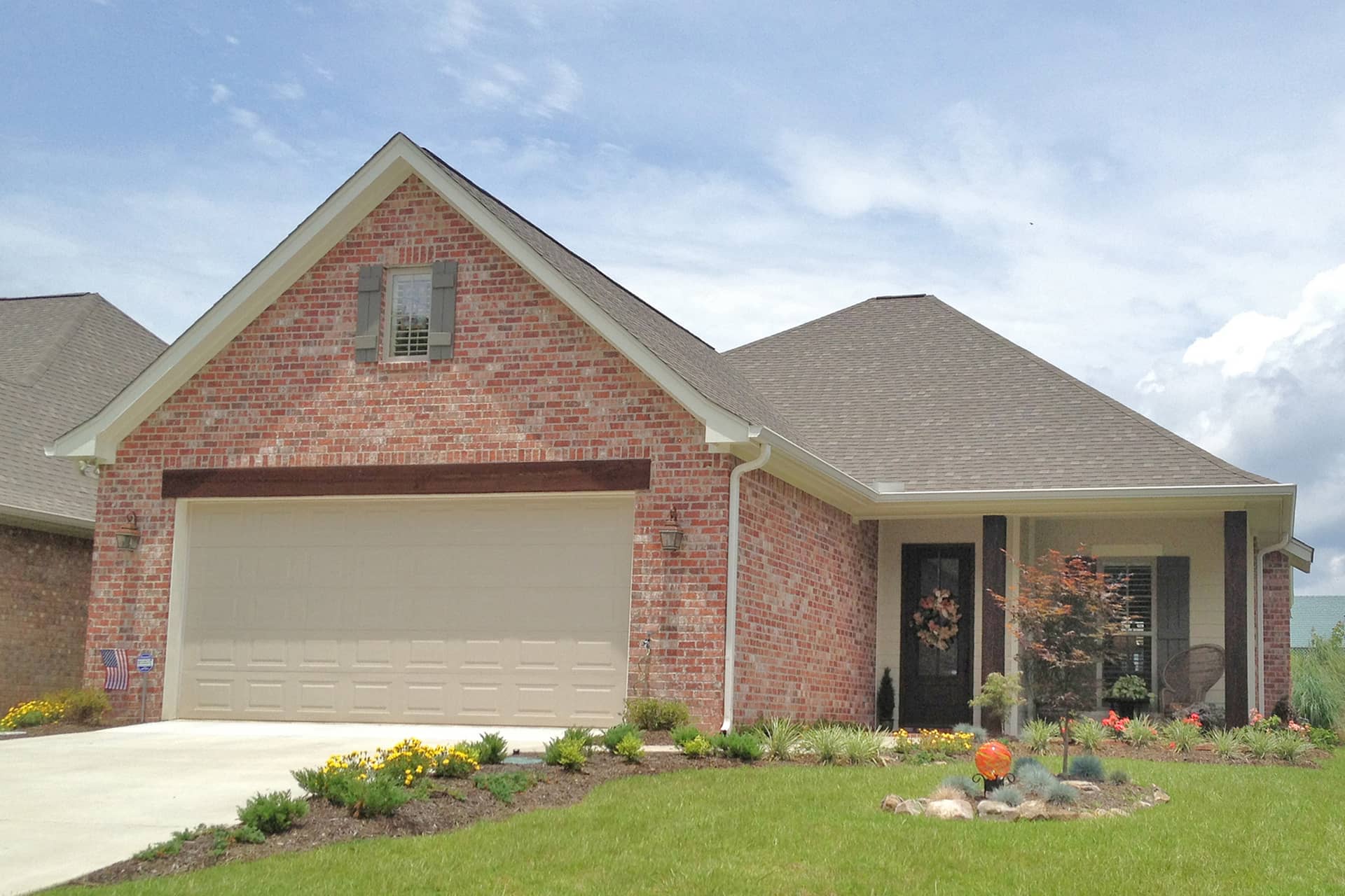 Front Elevation Photo of this Ranch Home (#142-1065) at The Plan Collection.