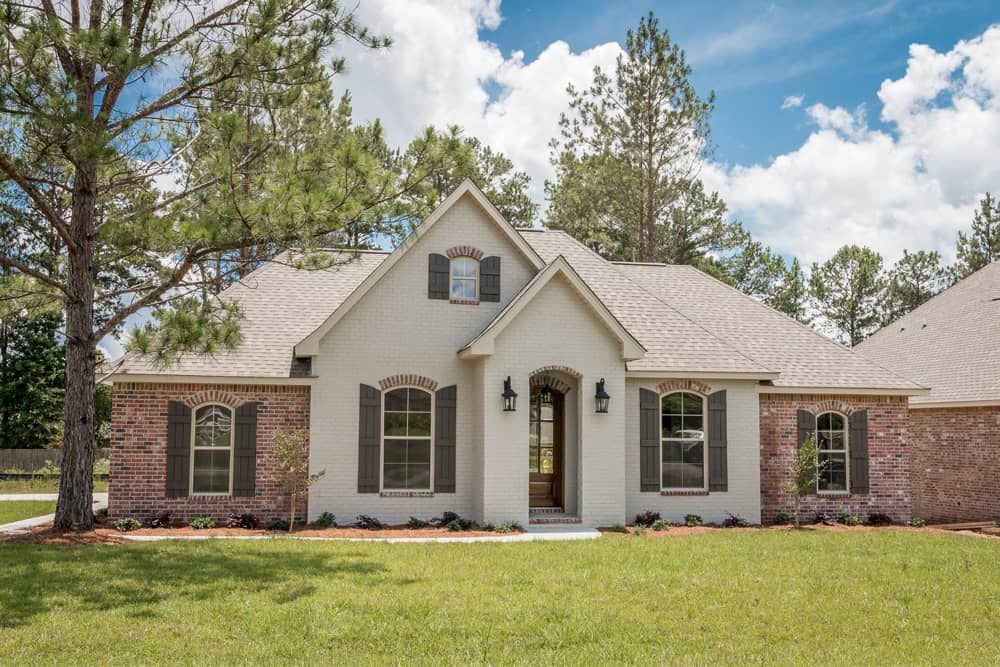 Front Elevation Photo of this Acadian House (#142-1069) at The Plan Collection.