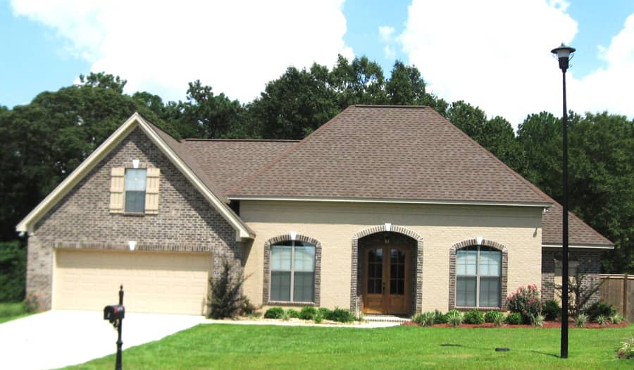 Front Elevation Photo of this Acadian House (#142-1088) at The Plan Collection.