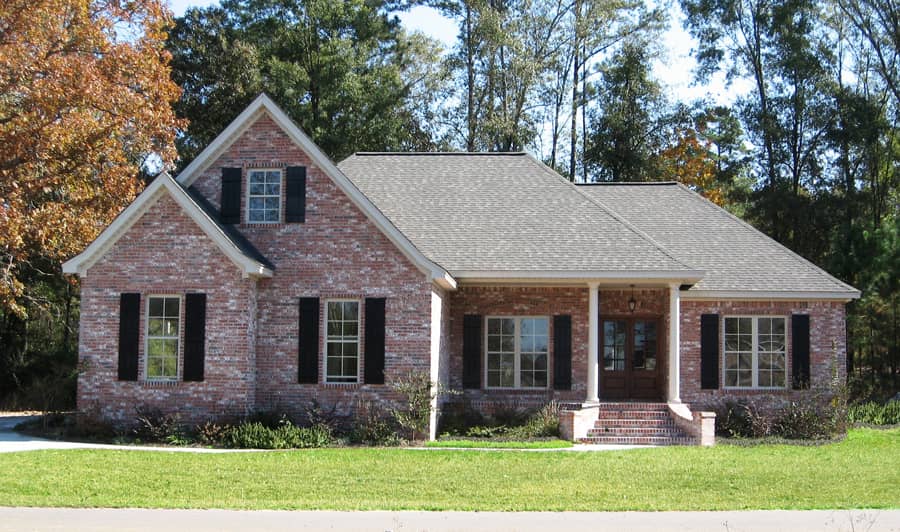Front Elevation Photo of this Acadian House (#142-1091) at The Plan Collection.
