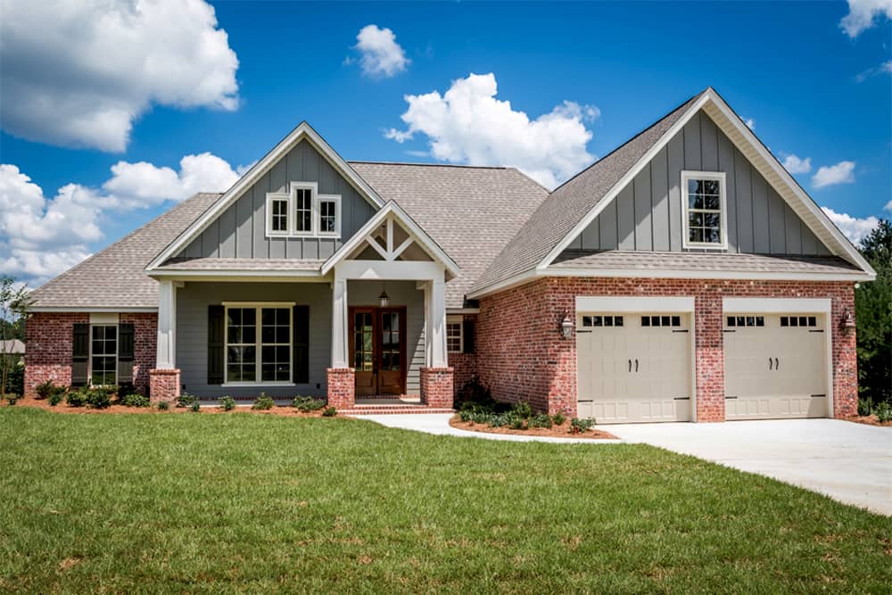 Color photograph of Craftsman home plan (ThePlanCollection: House Plan #142-1173)