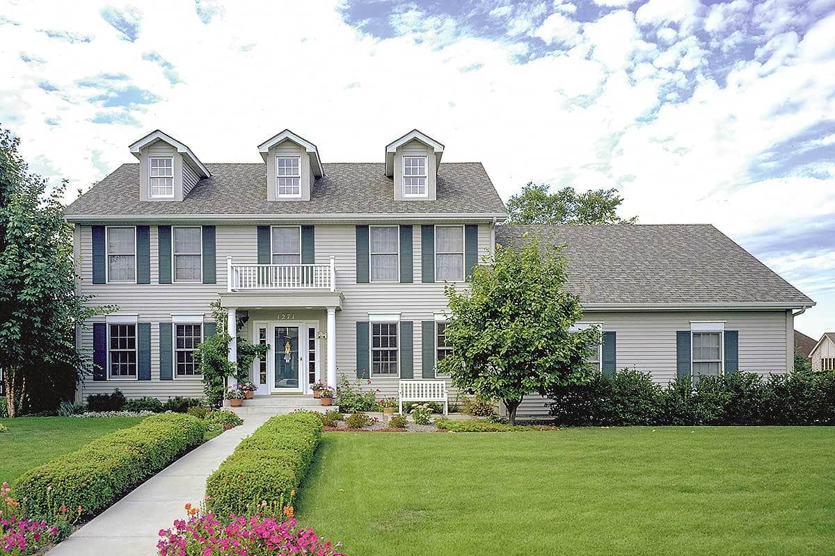 Front view of Colonial home (ThePlanCollection: House Plan #146-1263)
