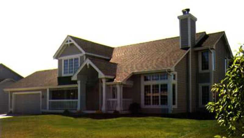 Front view of Country home (ThePlanCollection: House Plan #146-1300)