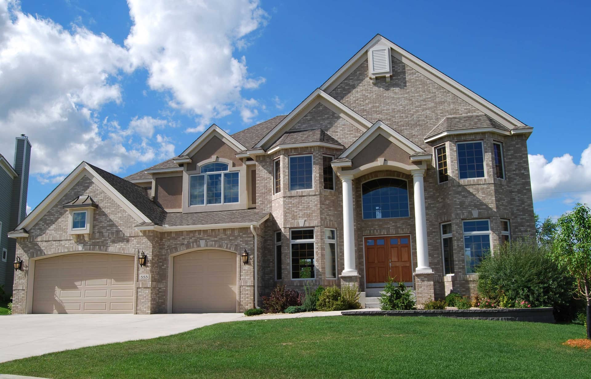 Front view of European home (ThePlanCollection: House Plan #146-1327)