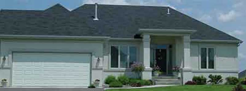 Front view of Prairie home (ThePlanCollection: House Plan #146-1911)