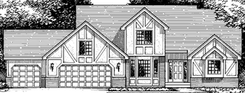 Front view of Tudor home (ThePlanCollection: House Plan #146-1974)