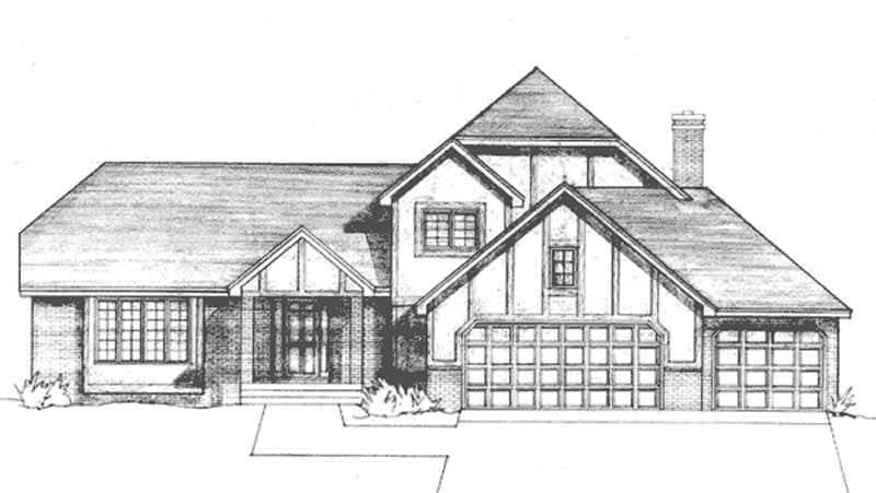 Front view of Tudor home (ThePlanCollection: House Plan #146-2018)