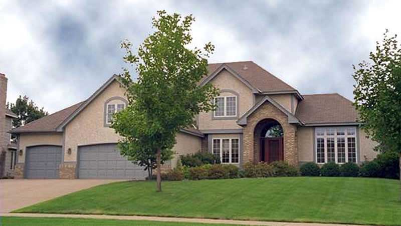 Front view of European home (ThePlanCollection: House Plan #146-2224)