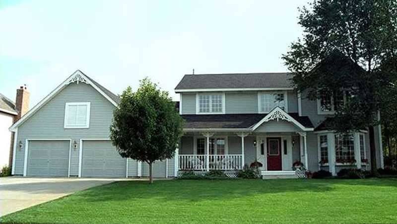 Front view of Country home (ThePlanCollection: House Plan #146-2317)