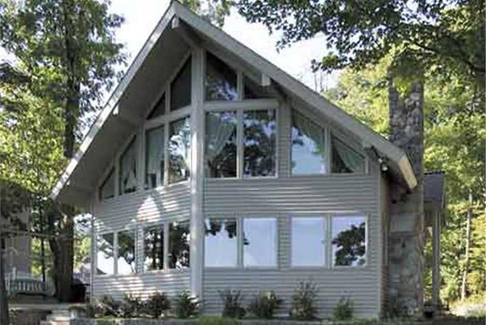 Front view of Vacation Homes home (ThePlanCollection: House Plan #146-2806)