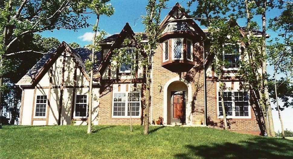 Traditional Tudor style house (ThePlanCollection: Plan #147-1083)