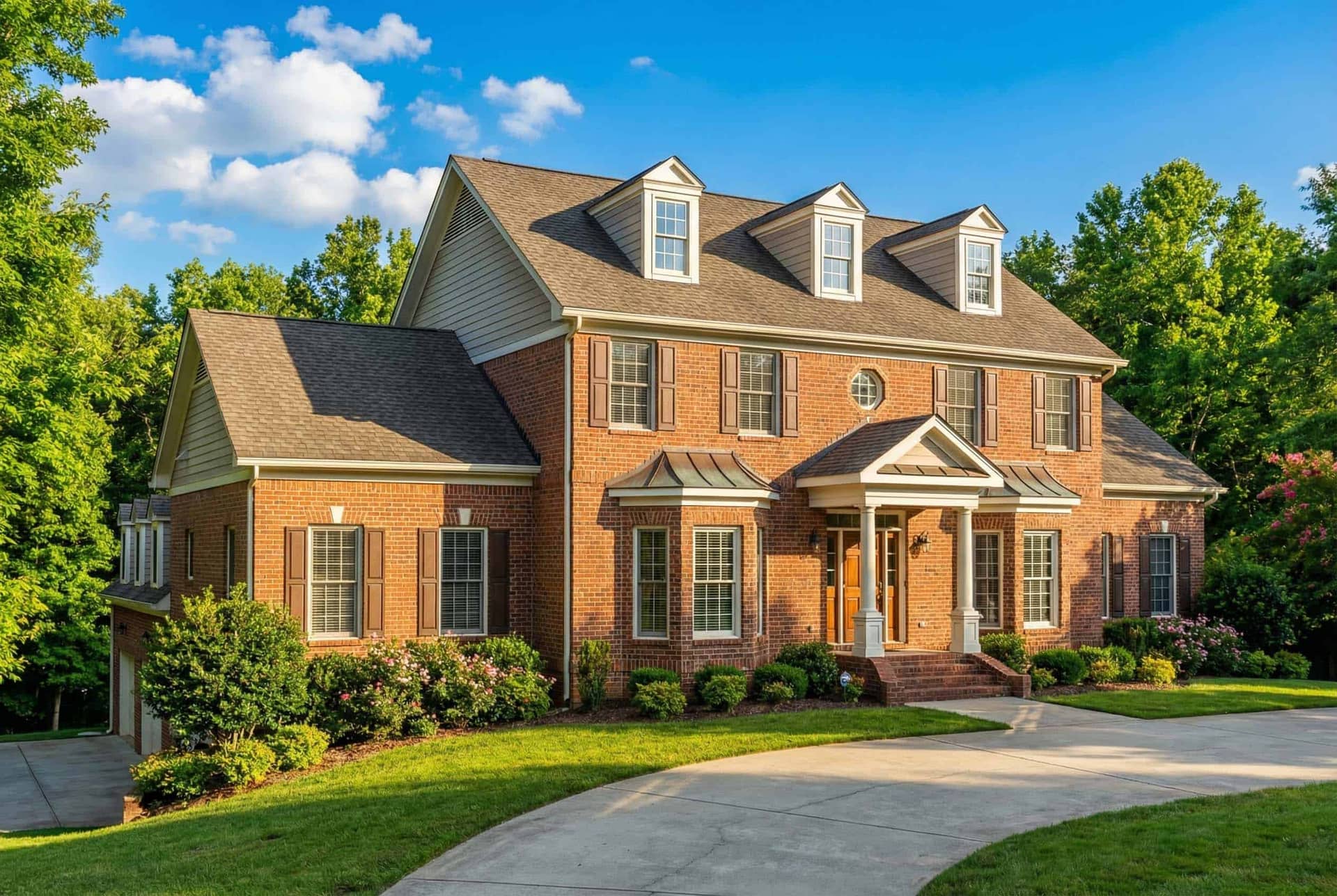 This image shows the front exterior for these Traditional House Plans.