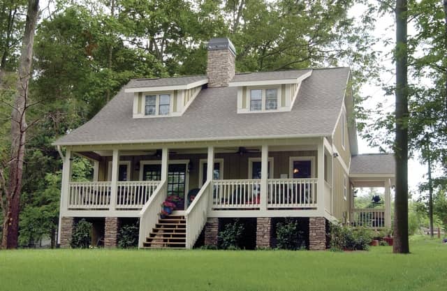 Color photograph of Farmhouse / Country home plan #153-1871