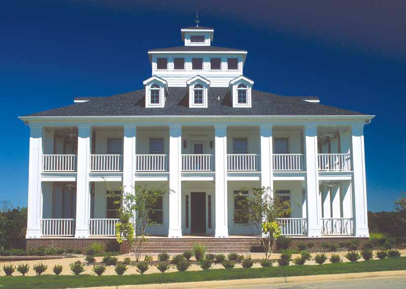 Front elevation of Colonial home (ThePlanCollection: House Plan #153-2134)