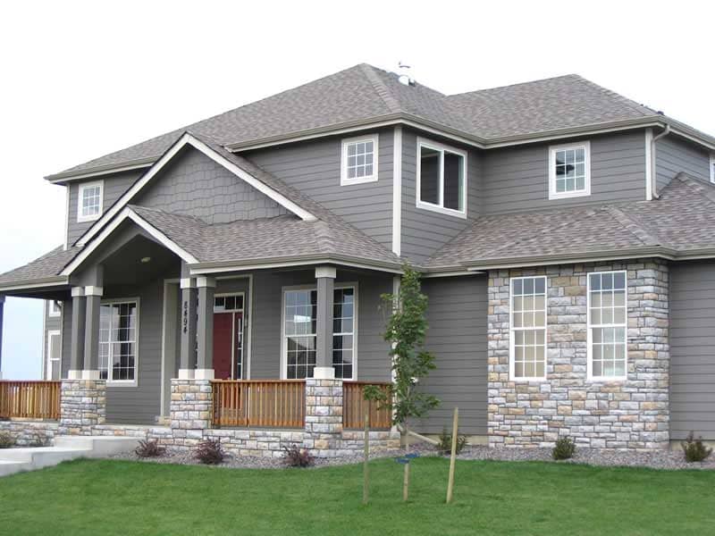 Front elevation of Contemporary Craftsman home (ThePlanCollection: House Plan #161-1033)