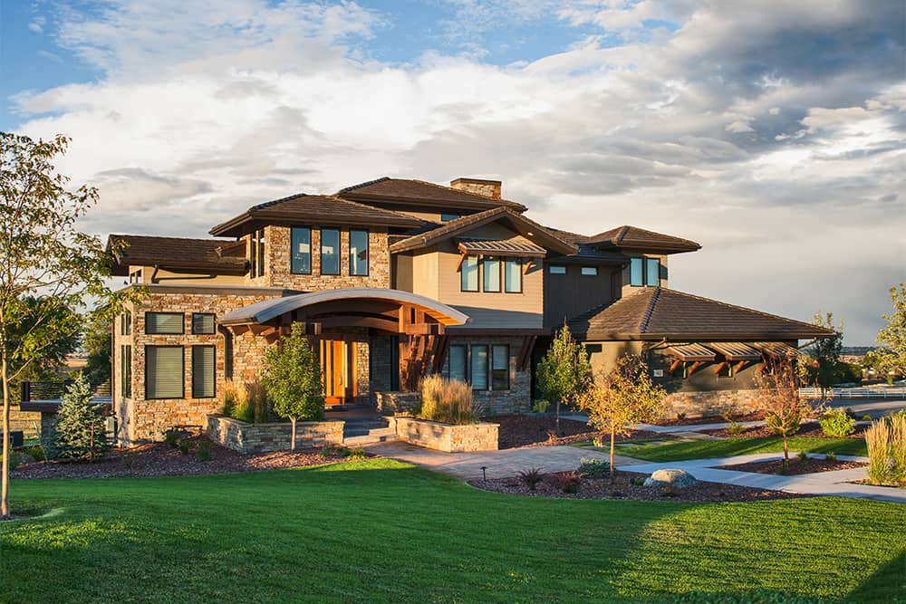 Front elevation of contemporary luxury home (ThePlanCollection: House Plan #161-1084)