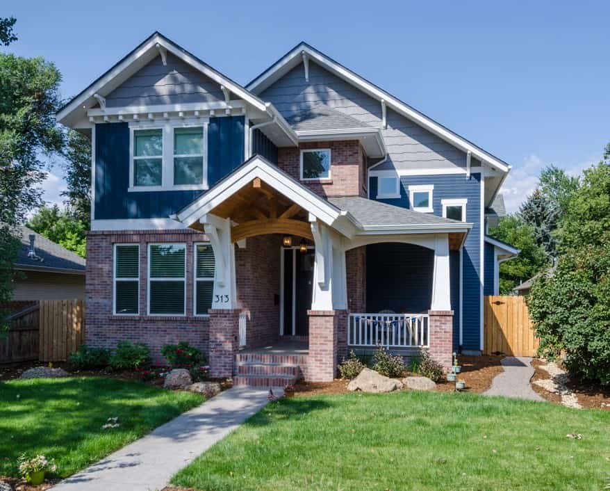 Front elevation of Craftsman home (ThePlanCollection: House Plan #161-1214)