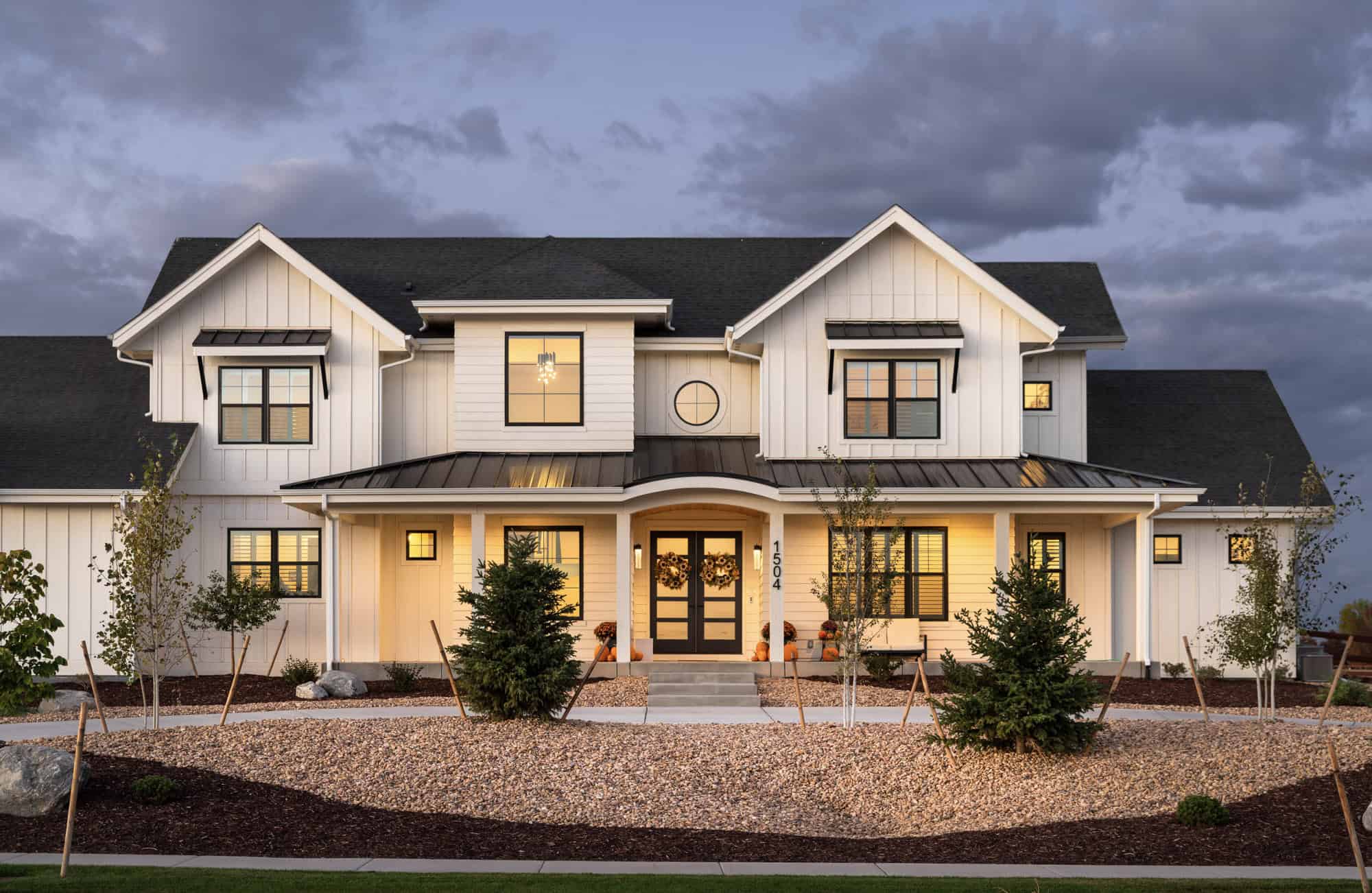 Front elevation of Modern Farmhouse home (ThePlanCollection: House Plan #161-1254)