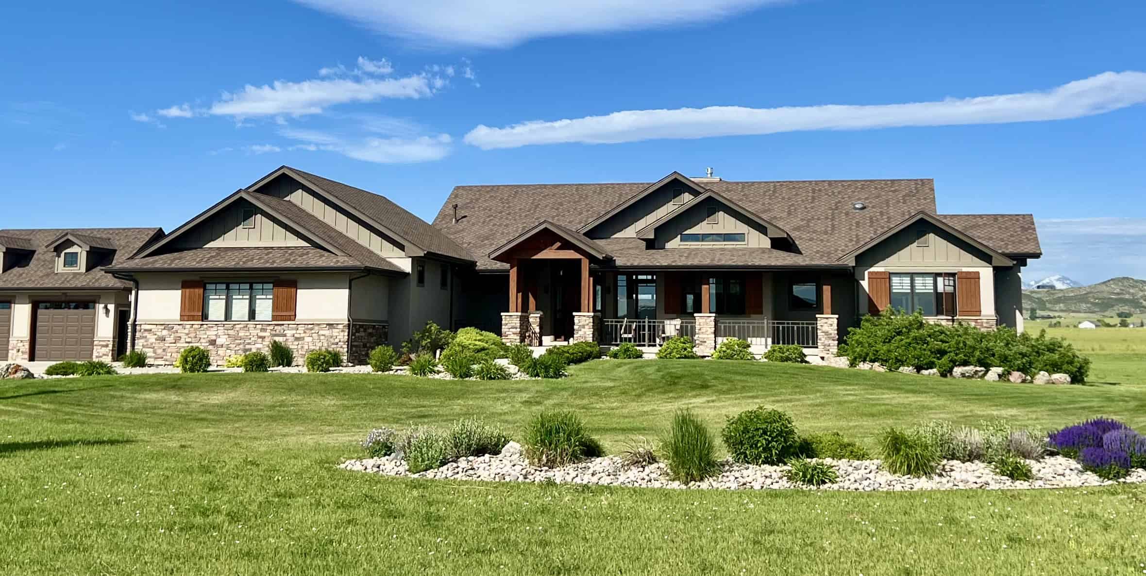 A Craftsman ranch home with stone accents, board-and-batten gables, and a covered front porch. 3 beds, 2,860 sq ft — Plan #161-1308.