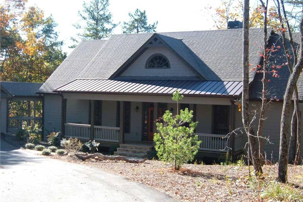 Color photograph of Country home plan (ThePlanCollection: House Plan #163-1009)