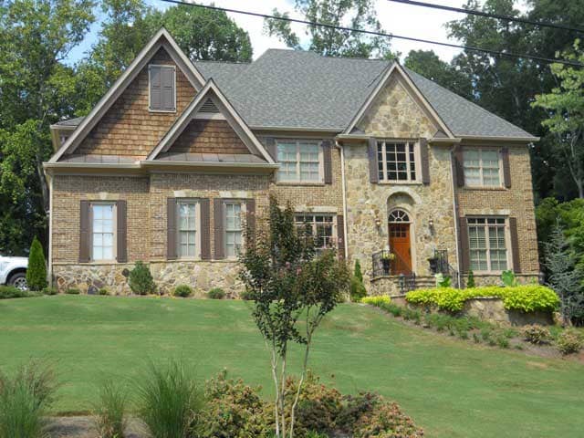 This is a color photo of these Craftsman Home Plans.