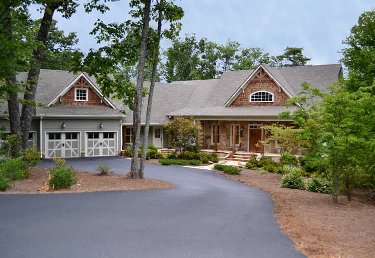 Color photograph of Craftsman home plan (ThePlanCollection: House Plan #163-1054)