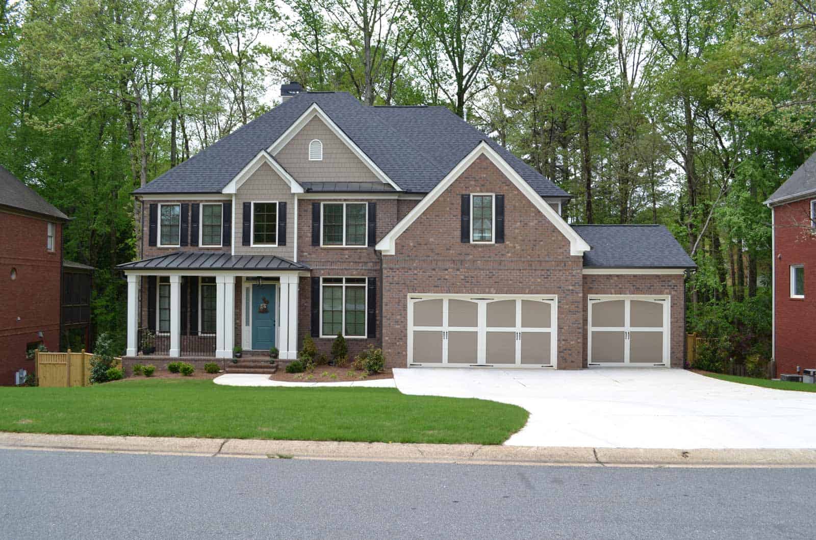 Front elevation of Farmhouse home (ThePlanCollection: House Plan #163-1100)