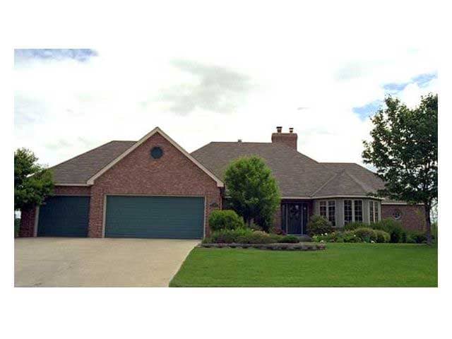 This is the front elevation of European Houseplans CLS-3302.