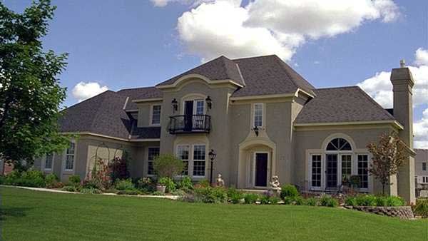 This image shows the front elevation of these European Houseplans.
