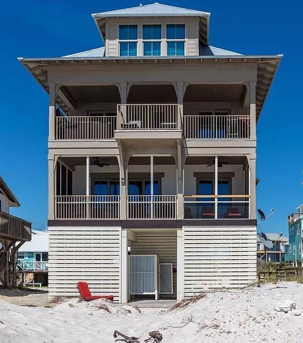 Front elevation of Beachfront home (ThePlanCollection: House Plan #168-1155)