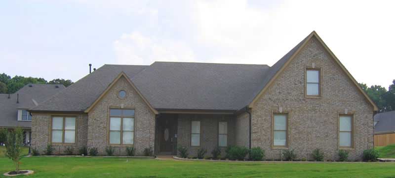 Front elevation of European home (ThePlanCollection: House Plan #170-1095)