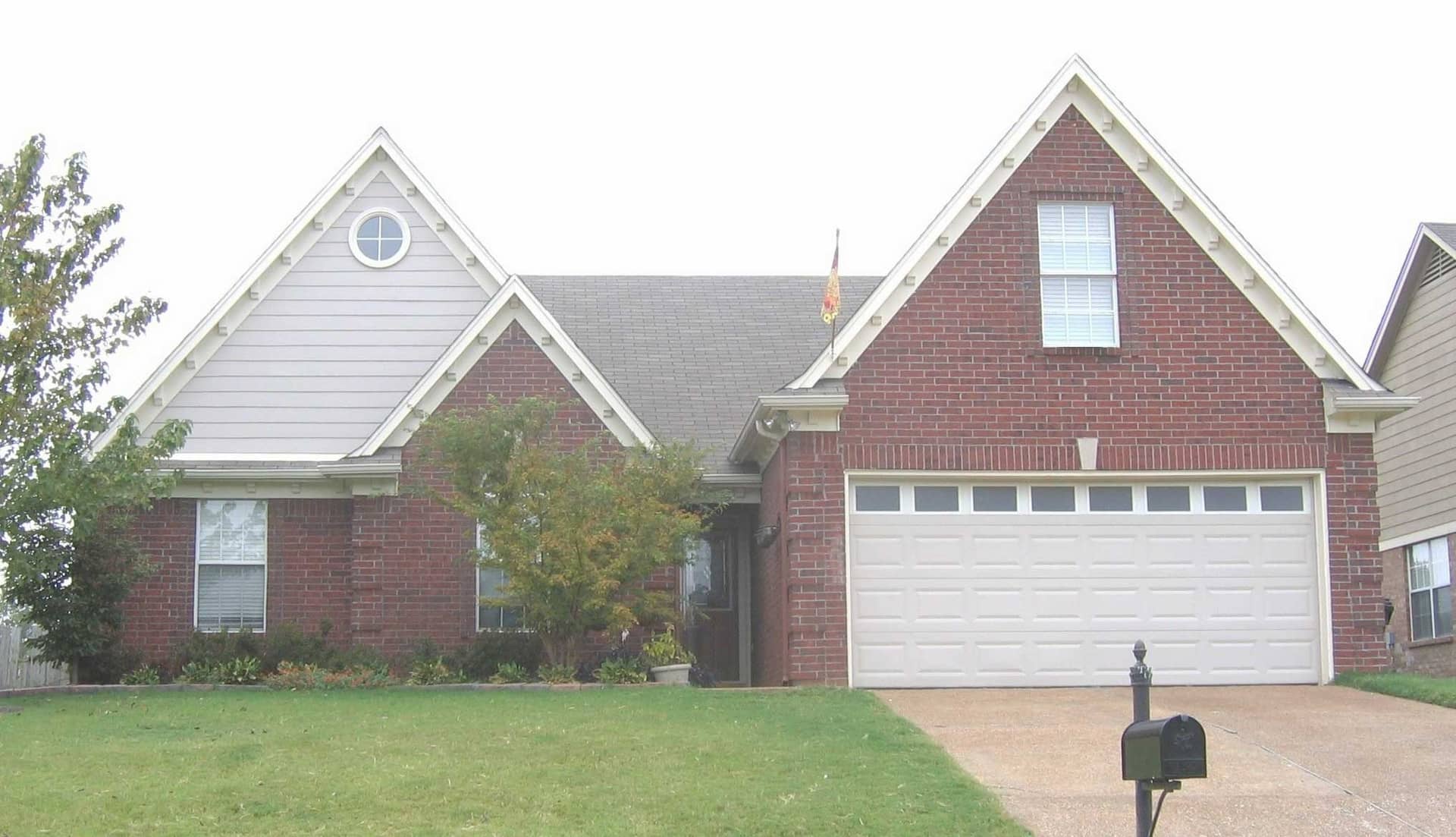 Front view of French home (ThePlanCollection: House Plan #170-1157)