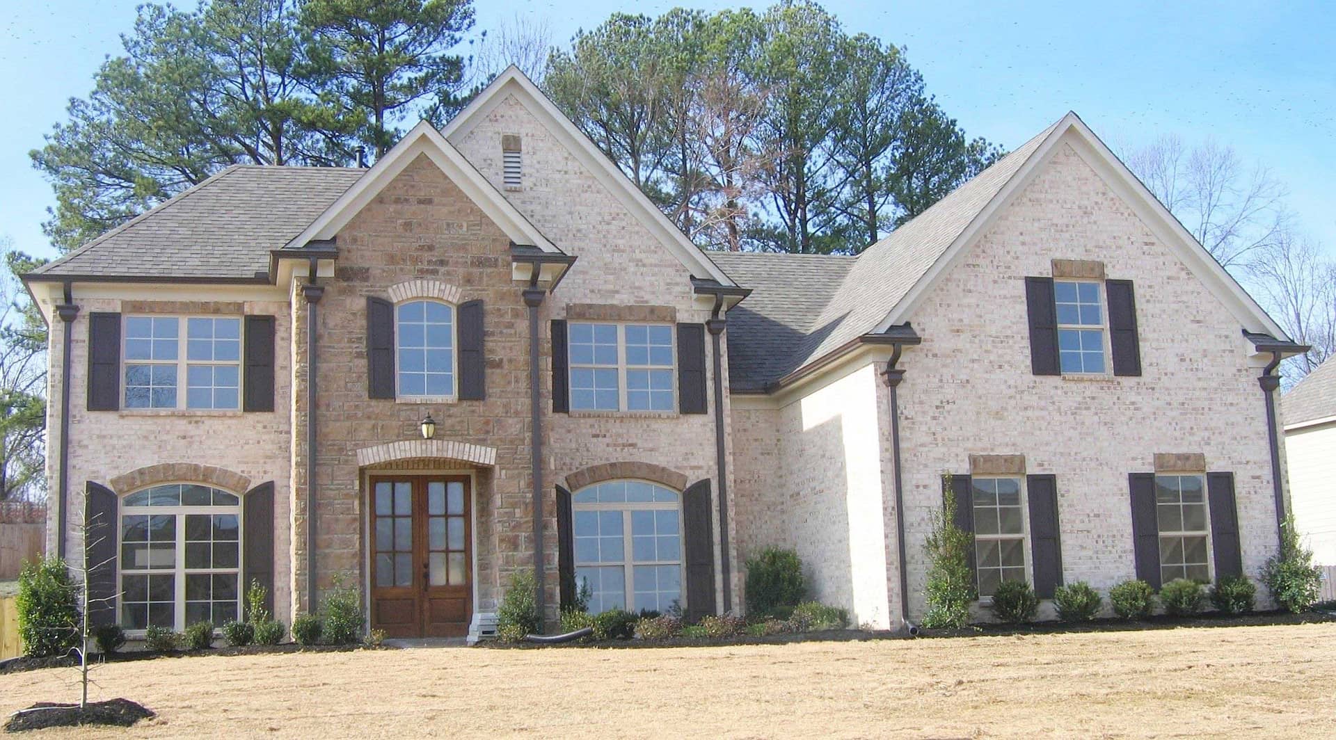 Front view of Country home (ThePlanCollection: House Plan #170-1164)