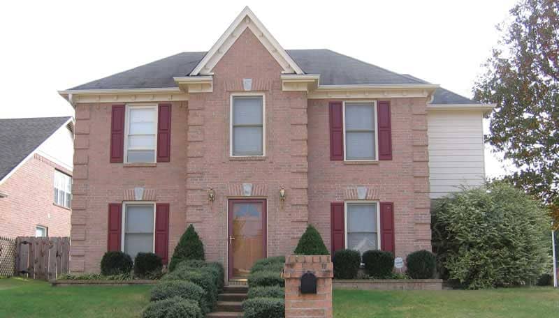 Front view of European home (ThePlanCollection: House Plan #170-1209)