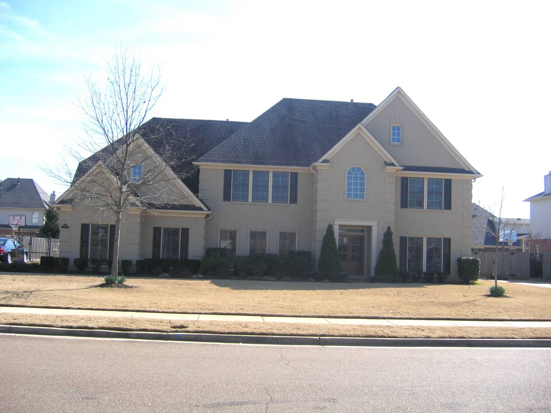 Front view of French home (ThePlanCollection: House Plan #170-1278)