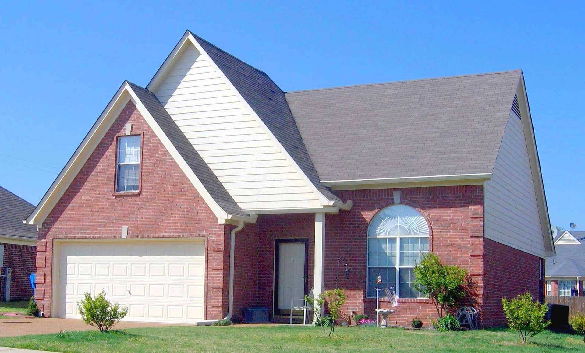 Front view of French home (ThePlanCollection: House Plan #170-1348)